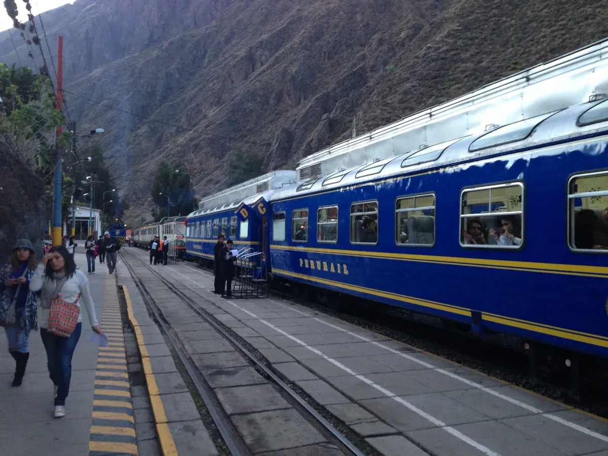 PeruRail carriages with roof windows at Ollantaytambo station, seen on an Inca Trail tour